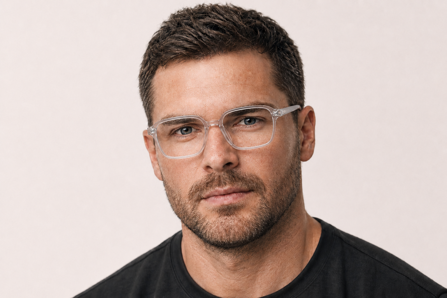 Man wearing 150mm Wide Fit Rectangle TR90 Glasses in clear, front view close-up