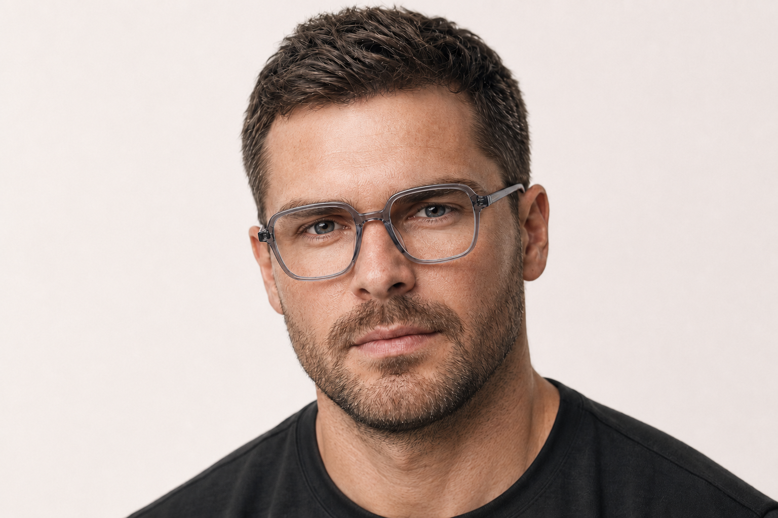 Man wearing 150mm Wide Fit Rectangle TR90 Glasses in grey, front view close-up